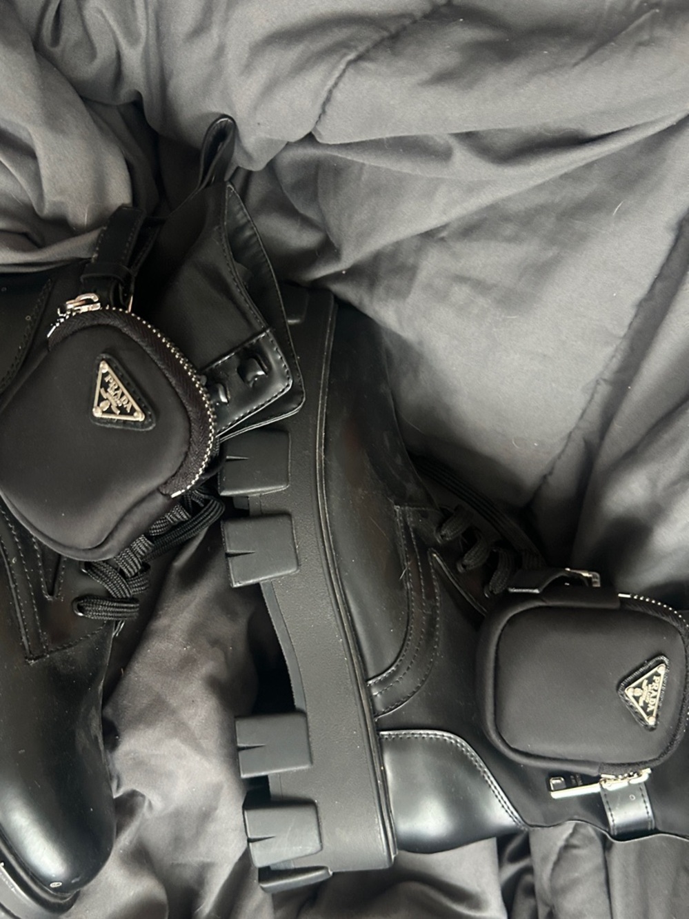 Prada Black Leather Lug-Sole Combat Boots with Mini Pouch